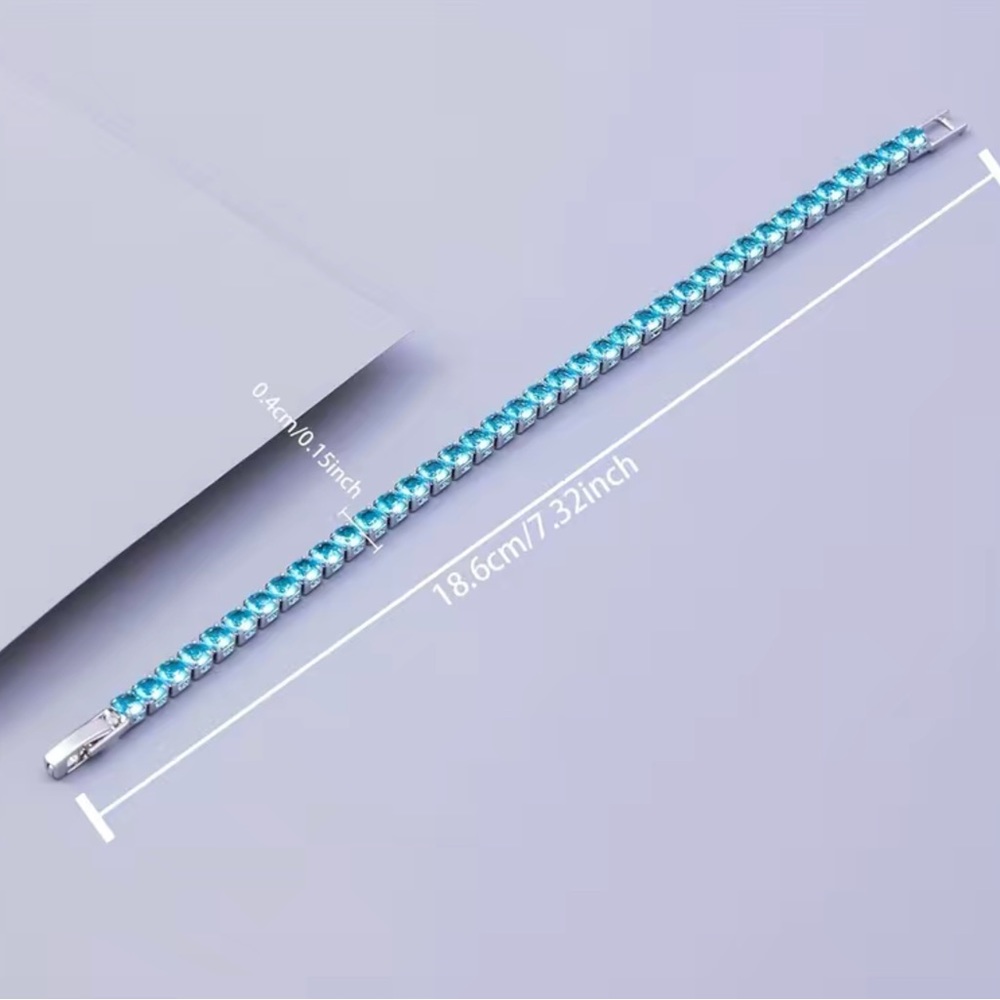 Beautiful Round Blue Topaz Bracelet In White Gold - Picture 11 of 12